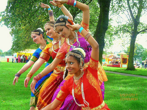 posing for journalists at the Edinburgh Mela Festival